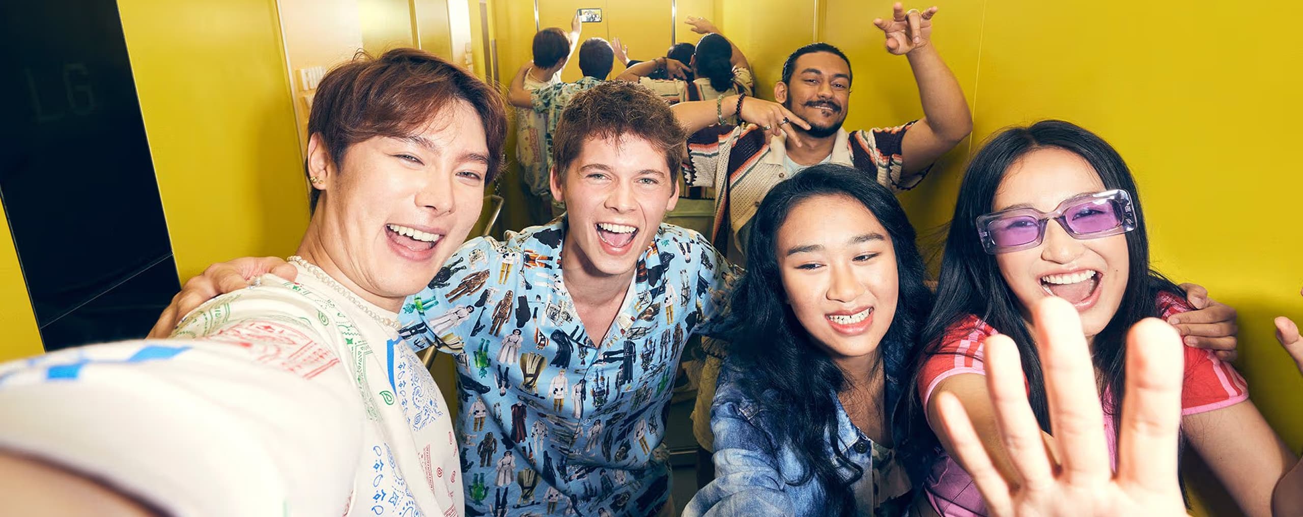 Group of young people taking mirror selfies